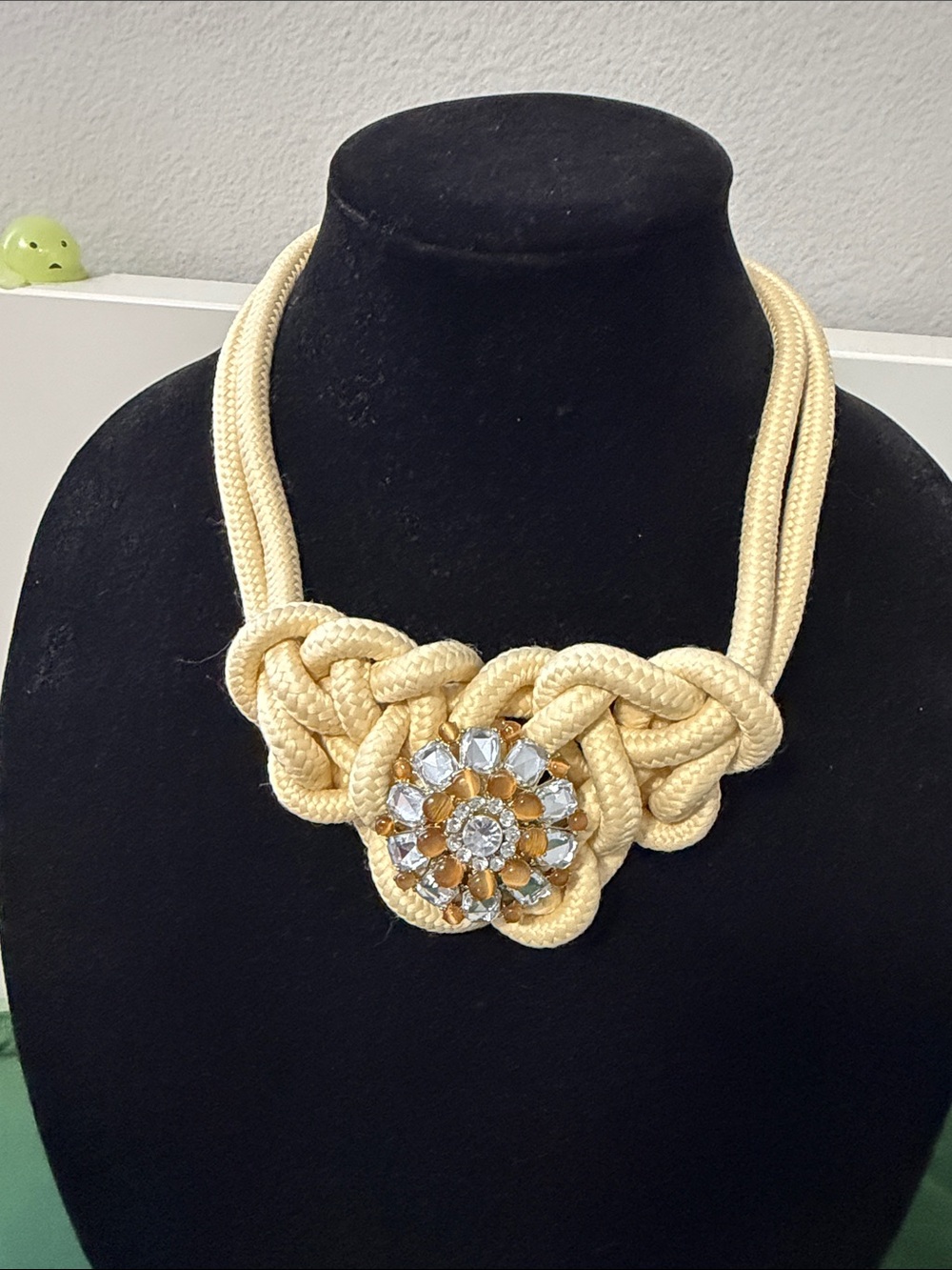 Elegant Cream Rope Knot Necklace with Crystal Brooch
